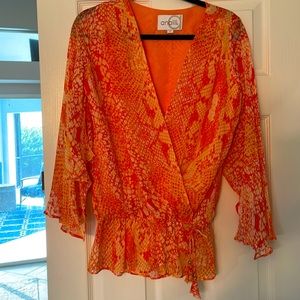 Beautiful orange snake print blouse